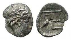 Ionia, Kolophon. ca.450-410 BC. AR Tetartemorion (6mm, 0.25g). Laureate head of Apollo right. / TE monogram, stork standing right, at left, all within...