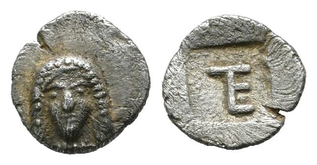 Ionia, Kolophon. ca.525-490 BC. AR Tetartemorion (7mm, 0.27g). Facing laureate h...