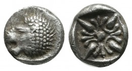 Ionia, Miletos. Late 6th-early 5th century BC. AR Obol – Hemihekte (9mm, 1.23g). Forepart of lion right, head reverted. / Stellate pattern within incu...