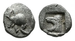 Mysia, Kyzikos. ca.450-400 BC. AR Hemiobol (6mm, 0.42g). Forepart of boar left; behind, tunny upward / Head of roaring lion left within incuse square....