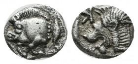 Mysia, Kyzikos. ca.480 BC. Obol AR (9mm, 0.76g). Forepart of boar left, tunny upward to right. / Head of roaring lion left, retrograde K to upper left...