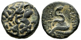 Mysia, Pergamon. ca.2nd century BC. Æ (18mm, 7.82g). Laureate head of Asklepios right. ΑΣΚΛΕΠΙΟΥ / ΣΩΤΗΡΟΣ. Serpent coiled around omphalos. SNG BN 180...