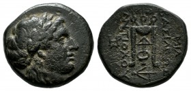 Seleukid Kingdom. Antiochos II Theos (261-246 BC). Æ (16mm, 3.96g). Sardes mint. Laureate head of Apollo right. / BAΣΙΛΕΩΣ / ANTIOXOY. Tripod. Monogra...