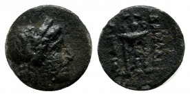 Seleukid Kingdom. Antiochos II Theos, 261-246 BC. Æ (10mm, 0.53g) . Sardes mint. Laureate head of Apollo right. / ΒΑΣΙΛΕΩΣ ΑΝΤΙΟΧΟΥ. Tripod. SG 524.3;...