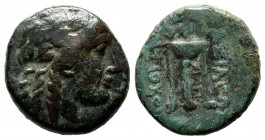 Seleukid Kingdom. Antiochos II Theos, 261-246 BC. Æ (16mm, 3.50g). Sardes mint. Laureate head of Apollo right. / ΒΑΣΙΛΕΩΣ ΑΝΤΙΟΧΟΥ. Tripod. SG 524.3; ...