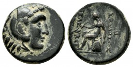 Seleukid Kingdom. Seleukos II Kallinikos, 246-226 BC. Æ (16mm, 4.15g). Sardes mint. Head of Hercules right wearing lion-skin headdress, paws tied at n...