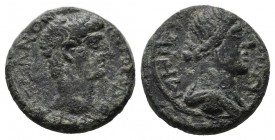 Asia Minor. Uncertain mint (The legend is not clear.) ca.1st. century AD. Æ (14mm, 2.38g). Draped bust right. / Turreted head of female right.