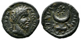Mesopotamia, Carrhae. Commodus AD.180-192. Æ (15mm, 2.59g). KOMOΔO. Laureate head right. / [...] ΑVΡ Κ Λ[ (retrograde, Α with curved crossbar). Cresce...