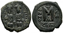 Justin II. AD.565-578. Æ (30mm, 14.25g). Constantinople mint, 1st. officina. Dated RY 7. D N IVSTINVS PP AV. Justin II and Sophia seated on throne fac...