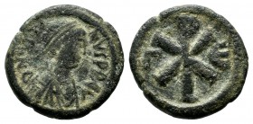 Justinian I. AD.518-527. Æ Pentanummium (14mm, 1.79g). Constantinople mint, 3rd officina. D N IVSTI-NVS P P AV. Diademed, draped and cuirassed bust ri...