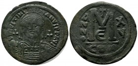Justinian I. AD.541-542. Æ Follis (29mm, 23.05g). Constantinople. D N IVSTINIANVS P P AVG, helmeted, draped, and cuirassed bust facing, holding globus...