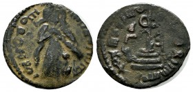 Umayyads. Arab-Byzantine type; 'Abd al-Malik, 65-86 H./685-705 AD. Æ Follis (19mm, 2.15g). Qinnasrîn. Caliph standing facing, holding the sword in the...
