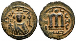 Umayyads. Undated, ca.661-697 AD. Æ Fals (21mm, 3.92g). Hims (Emesa) mint. Type VII. Facing bust of Byzantine emperor, holding globus cruciger; KAΛON ...