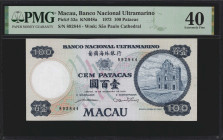 MACAU. Banco Nacional Ultramarino. 100 Patacas, 1973. P-53a. PMG Extremely Fine 40.

Watermark of Sao Paulo Cathedral. An appealing mid-grade note....