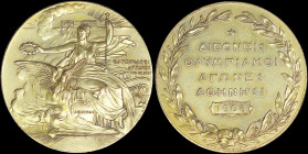 GREECE: Athens 1906 Olympic Games, participants gilt medal. Seated Nike holding laurel wreath over phoenix emerging from flames with Acropolis in back...