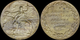 GREECE: Athens 1906 Olympic Games, participants medal (probably in brass). Seated Nike holding laurel wreath over phoenix emerging from flames & Acrop...