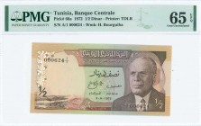 TUNISIA: 1/2 Dinar (3.8.1972) in brown on multicolor unpt with Habib Bourguiba at right. Low S/N: "A/1 000624". WMK: Habib Bourguiba. Printed by (T)DL...