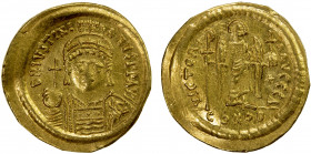 BYZANTINE EMPIRE: Justinian I, 527-565, AV solidus (4.28g), Constantinople, S-140, 4th officina, cuirassed bust facing, wearing helmet with pendilia, ...