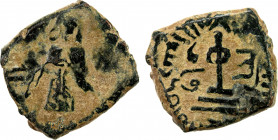 ARAB-BYZANTINE: Standing Caliph, ca. 692-697, AE fals (3.88g), uncertain mint, ND, A-3544, the mint name appears to be LTAY or LMAY, which has not bee...