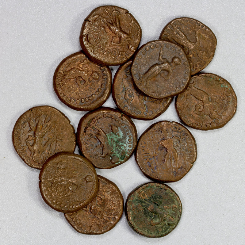 YAUDHEYAS: LOT of 12 copper units, standard issue: Karttikeya holding spear, pea...
