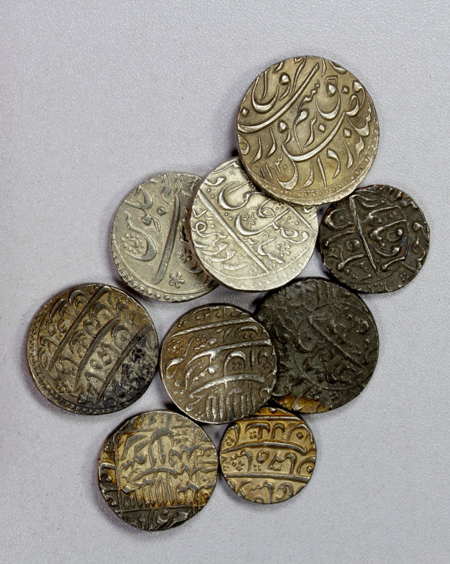 MUGHAL: LOT of 9 silver coins, rupees unless noted, including Shah Jahan I: half...