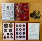 ASIA: LOT of 39 items, group of Chinese cash coins (12), Japanese cash coins (5), Japanese charms (4), all set in "Japanese Coin Collection" red book,...