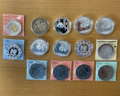 WORLDWIDE: LOT of 14 coins, ASW 7.9920, including Pandas: China/People's Republic 10 yuan: 2011 (4 pcs); and Central African Republic: 2015 100 francs...