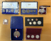 WORLDWIDE: LOT of 4 sets, 2 coins, & 1 medal, including Austria: 1963 restrike silver 2 ducats Bruce-XM29a Choice Proof; Bolivia:1975 3-piece Unc. sil...