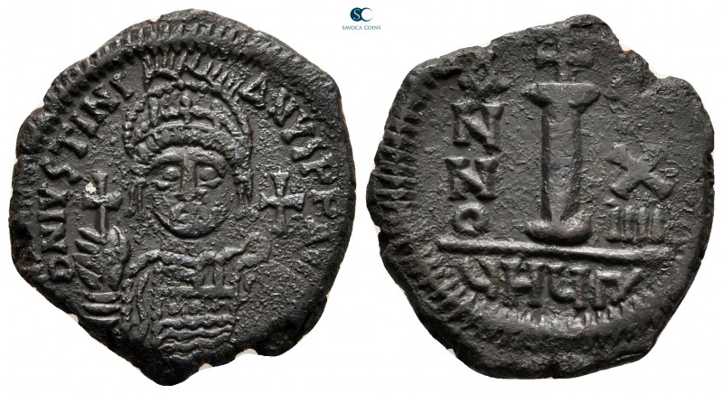 Justinian I AD 527-565. Theoupolis (Antioch)
Decanummium Æ

23 mm, 5,29 g

...
