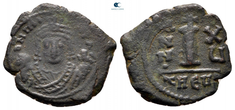 Maurice Tiberius AD 582-602. Theoupolis (Antioch)
Decanummium Æ

18 mm, 2,22 ...