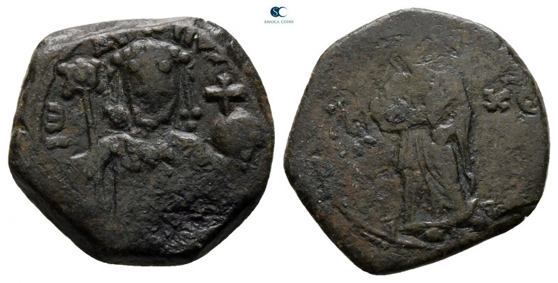 John II Comnenus AD 1118-1143. Thessalonica
Half Tetarteron Æ

16 mm, 2,30 g...