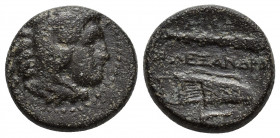 Alexander III (336-323) AE 5.7gr, 17.2mm. Obv. Head of Heracles right, wearing lion’s skin headdress. Rev. ALEXANΔPOY, above, club, and below, bow and...