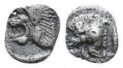 Mysia. Kyzikos. circa 480 BC. AR Hemiobol 0.2gr, 7.1mm. Forepart of boar to left, to right, tunny fish upwards / Head of lion to left within incuse sq...