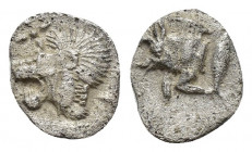 Mysia. Kyzikos. circa 480 BC. AR Hemiobol 0.2gr, 8.3mm. Forepart of boar to left, to right, tunny fish upwards / Head of lion to left within incuse sq...