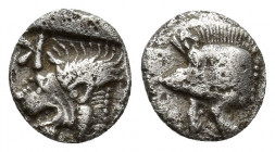 Mysia, Kyzikos, 450 - 400 BC. AR Obol, 0.6gr, 9.4mm. Head of roaring lion left, retrograke K above, all within incuse square./Forepart of boar to left...