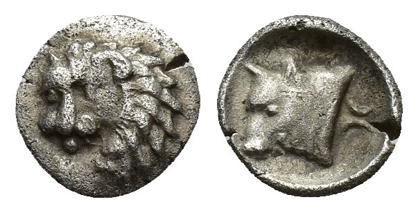 CARIA. Uncertain. Obol (Circa 400-340 BC). 0.2g 8mm Obv: Head of lion left. Rev:...