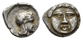 Pisidia. Selge. circa 350-300 BC. Obol AR 9.7mm., 0.8gr. Facing gorgoneion / Helmeted head of Athena right.
