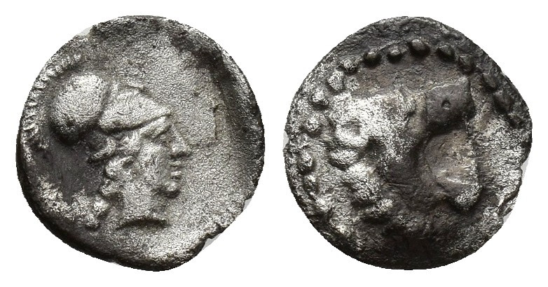 Pamphylia, AR Obol Side ca. 400-380 BC. 0.6g 10.9mm Head of lion right / Helmete...