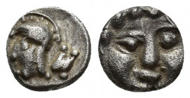 Pisidia, Selge AR Obol. Circa 350-300 BC. 1g. 9 mm Facing gorgoneion with protruding tongue. Rev: Head of Athena to left, wearing crested Attic helmet...