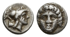 Pisidia, Selge, Obol, 1gr, 8.8mm. 350-300 BC Obverse: facing gorgoneion Reverse: head of Athena in corynthian helmet right astragalos to left