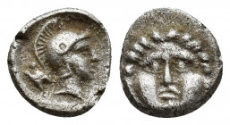 Pisidia, Selge, Obol, 1gr, 10.1mm. 350-300 BC Obverse: facing gorgoneion Reverse: head of Athena in corynthian helmet right astragalos to left