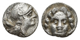 Pisidia, Selge, Obol, 1gr, 9.7mm. 350-300 BC Obverse: facing gorgoneion Reverse: head of Athena in corynthian helmet right astragalos to left