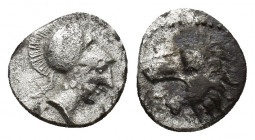 PISIDIA. Selge. Circa 350-300 BC. Obol 10.2 mm, 0.7gr. Head of a lion to left. Rev. Head of Athena to right, wearing crested Corinthian helmet.