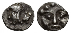 Pisidia, Selge AR Obol. Circa 350-300 BC. 0.9g. 9.1 mm Facing gorgoneion with protruding tongue. Rev: Head of Athena to left, wearing crested Attic he...