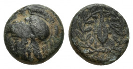 AIOLIS, Elaia. After 340 BC. Æ 10mm. 1.7g. Head of Athena left in Corinthian helmet / Grain-seed within olive-wreath.