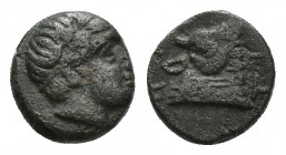 LESBOS. Mytilene. Ae (Circa 440-400 BC). 0.7g. 7.7mm Obv: Laureate head right. Rev: MYT. Calf's head right.