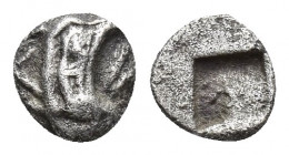 IONIA, Teos (or Phokaia). Circa 500-475 BC. AR Tetartemorion (6mm, 0.2 g). Head of griffin right / incuse square