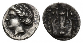 IONIA, Kolophon. Circa 330-285 BC. AR Hemidrachm (1.1 g 10.3 mm). Laureate head of Apollo left / Lyre; magistrate EKATAIOS.