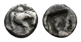 Ionia. Teos circa 550-540 BC. AR 5.5mm., 0,1g. Forepart of griffin right / Incuse square punch.