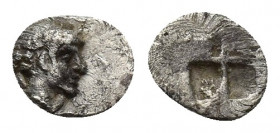 IONIA, Kolophon(?). 5th century BC. AR Tetartemorion (5.3mm, 0.1 g). Male head right / Quadripartite incuse square.